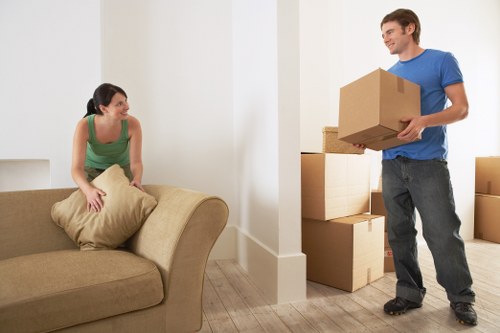Packed moving boxes and furniture ready for removals in Southcroydon
